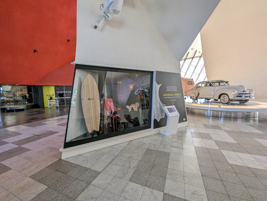 Sine Surf hollow wooden surfboard on display in new museum exhibition